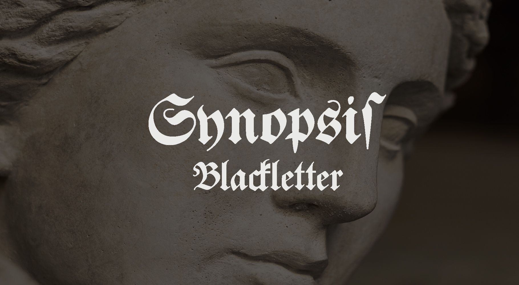 synopsis blackletter with a statue in the background