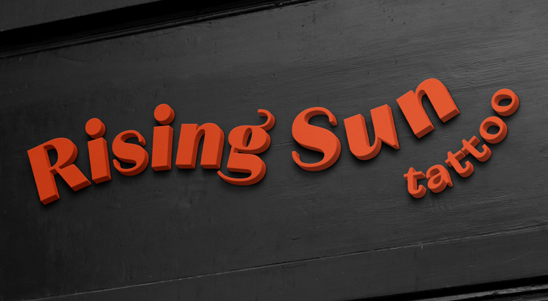 Red Rising Sun logo displayed on a black building.